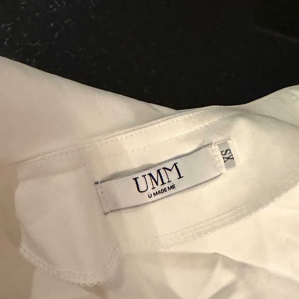 Elegant White Blouse with Blue Trim - Picture 2 of 3